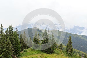 Panorama view with alpine mountains and clouds in Salzburgerland, Austria