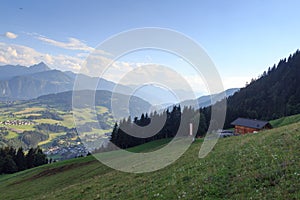 Panorama view in the alps with mountain hut and blue sky in Salzburgerland, Austria