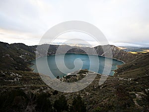 Panorama view of andean volcano caldera crater lake Quilotoa rim ridge loop in Cotopaxi Ecuador andes South America