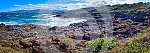 Panorama view from Bass Point Reserve across Pacific Ocean to Mystics Beach, Minnamurra with Saddleback Mountain