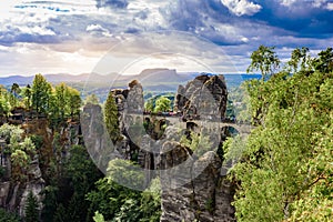 Panorama view on the Bastei bridge. Bastei is famous for the beautiful rock formation in Saxon Switzerland National Park, near