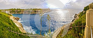 Panorama view on bay and Torre den Beu Cala Figuera photo