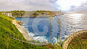 Panorama view on bay and Torre den Beu Cala Figuera photo