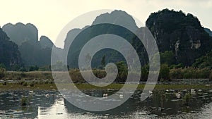 Panorama view of beautiful karst scenery, river and rice paddy fields