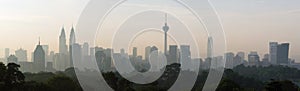 Panorama view of beautiful kuala lumpur cityscape skyline in the hazy or foggy morning enviroment