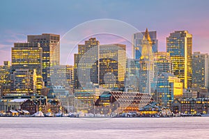 Panorama view of Boston skyline with skyscrapers over water at twilight inUSA