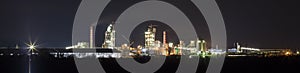 Panorama view of cement plant and power sation at night in Ivano-Frankivsk, Ukraine