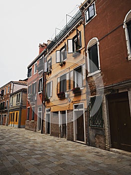 Panorama view of charming picturesque historic colourful house facades in empty streets of Murano Venice Veneto Italy