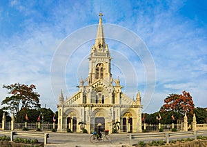 Panorama view of a commune church in Kim Son district, Ninh Binh province, Vietnam. The building is a travel destination for touri