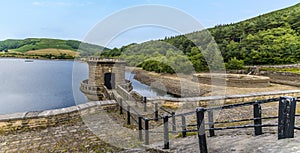 A panorama view from the dam wall towards the wooded shore of Ladybower reservoir, Derbyshire, UK