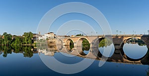 Panorama view of the Dordogne River and old stone bridge leading to Bergerac