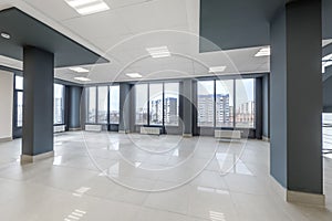 panorama view in empty modern hall with columns, doors , stairs and panoramic windows