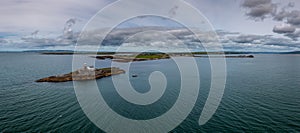 Panorama view of the historic Fenit Lighthouse on Little Samphire Island in Tralee Bay