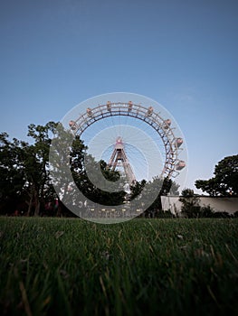 Panorama view of historic Giant Ferris Wheel ride Wiener Riesenrad in Prater amusement park Leopoldstadt Vienna Austria