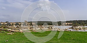 Panorama view of the historic Ponte de Ajuda bridge over the Guadiana River photo