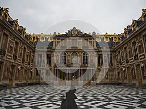 Panorama view of historical gold Marble Court entrance facade architecture of Versailles Castle Palace Paris France
