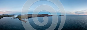 Panorama view of the Iveragh Peninsula with Valentia Island and Portmagee at sunset