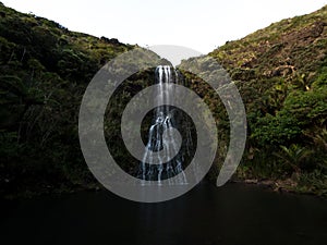 Panorama view of Karekare waterfall river lake pond green nature landscape in Waitakere Ranges West Auckland New Zealand