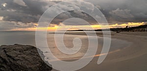 Panorama view of La Pelosa beach in Sardinia at sunrise