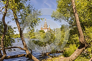 Panorama with a view of the lake and the church in the background on a sunny day