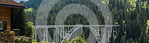 Panorama view of the Langwies Viaduct in the mountains of Switzerland near Arosa