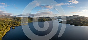 Panorama view of Lough Caragh lake in the Glencar Valley of Kerry County in warm eveing light