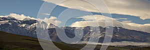 panorama view of the Majella mountain in Abruzzo Italy, with blue sky and clouds also called the little Tibet. Banner