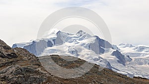 Panorama view with mountain Dufourspitze in mountain massif Monte Rosa in Pennine Alps, Switzerland