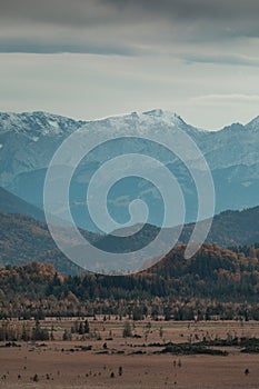 Panorama view over Murnauer Moos landscape with Bavarian Alp mountains during autumn