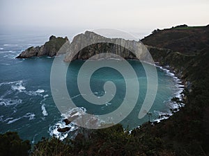 Panorama view of Playa del Silencio Gavieiro beach ocean sea coast shore cliffs in Castaneras Asturias Spain Europe photo