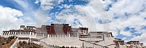 Panorama view of Potala Palace in summer sunny day, winter palace of Dalai Lama, blue sky and cloud in background, Lhasa Lasa of photo