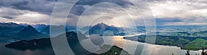 Panorama view of Quatre Cantons Lake under a storm