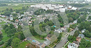 Panorama view residential neighborhood district in American town, in Woodbridge NJ near oil refinery industrial tank