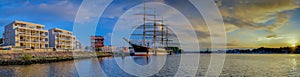 Panorama view of river Trave with the tall sailing ship Passat