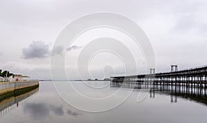 Panorama view of the riverfront promenade and historic pier on the Rio Tinto River in downtown Huelva photo