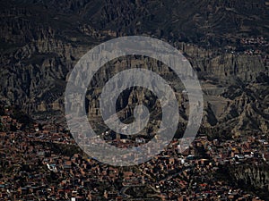 Panorama view of rock formations landscape in La Paz cityscape buildings urban city Bolivia South America