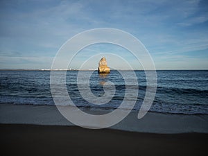 Panorama view of rock formations at Praia do Camilo picturesque atlantic ocean sand beach in Lagos Algarve Portugal
