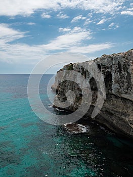 Panorama view of rocky cliff coast shore turquoise mediterranean sea ocean water Mallorca Majorca Balearic Islands Spain