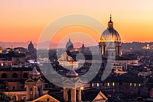 Panorama view of Rome at sunset with St Peter Cathedral