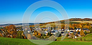 Panorama view Seiffen in Autumn . Saxony Germany ore mountains with blue sky