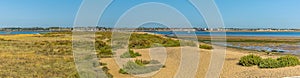 A panorama view from the shore of the Colne River towards Brightlingsea, UK