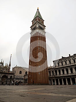 Panorama view of St Marks Square Piazza San Marco basilica church cathedral bell clock tower Campanile in Venice Italy