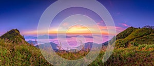 Panorama view of the sunrise at Doi Pha Tang, Chiang Rai, Thailand.