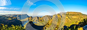 Panorama view of a Sunset over Blyde Caniyon Dam and the three Rondavels of Blyde River Canyon Nature Reserve