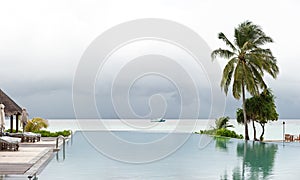 Panorama view of swimming pool in beach resort