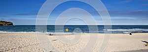 Panorama view of Sydney Bronti Beach NSW Australia. White Sandy Beach, turquoise blue water and surfing waves