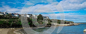 Panorama view of Sydney Bronti Beach NSW Australia. White Sandy Beach, turquoise blue water and surfing waves