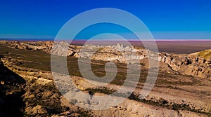 Panorama view to Aral sea from the rim of Plateau Ustyurt at sunset , Karakalpakstan, Uzbekistan