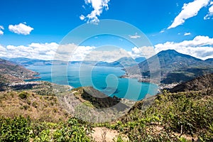 Panorama view to the lake Atitlan with volcanos - small villages San Pedro, San Marcos, San Juan and Panajachel at lake Atitlan in