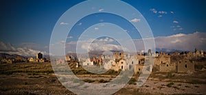 Panorama view to muslim cemetery Semiz Bel at Kochkor in Naryn, Kyrgyzstan photo